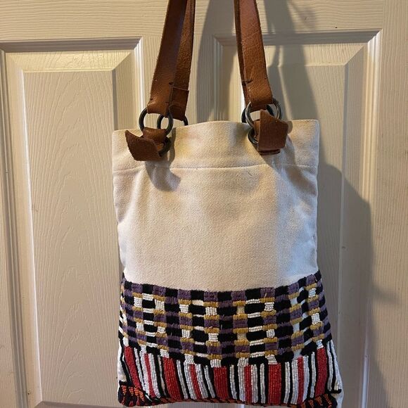 Jasper &Jeera beige canvas tote with multi color beads appliqué &leather straps - Picture 1 of 12